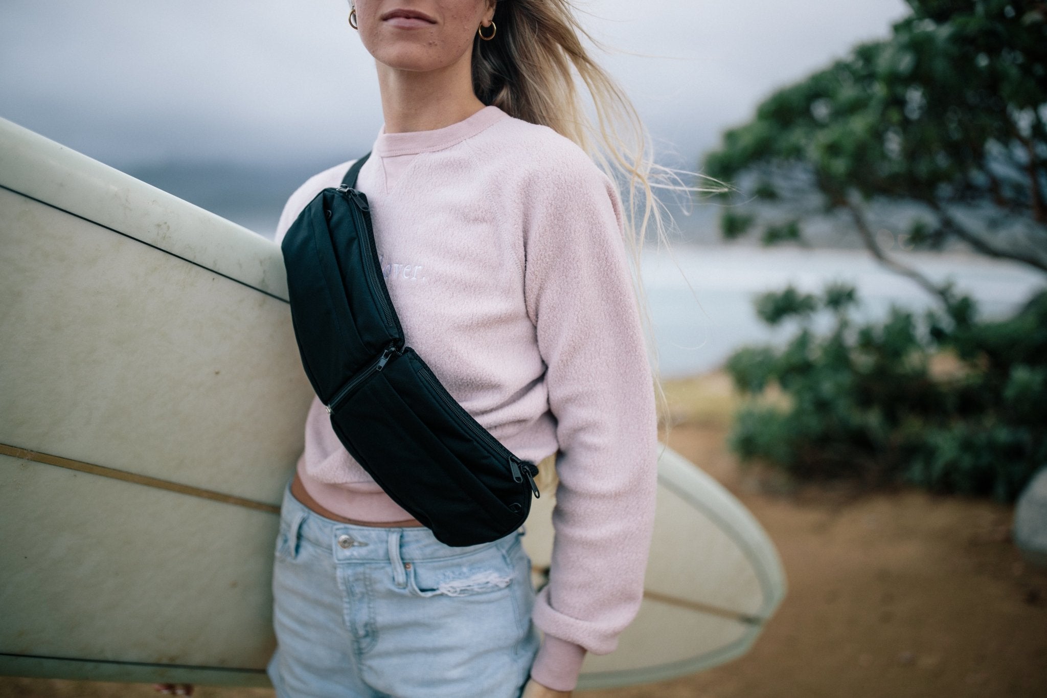 Waist bag outlet across chest